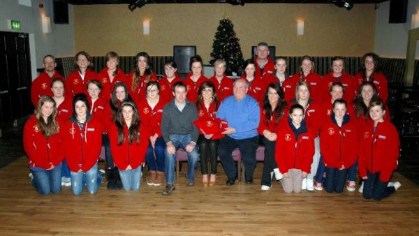 2012-12-22 Presenting fleeces for Millstreet Camogie Club - The Minor and U16 Camogie teams and trainers with Frank and Derry Casey