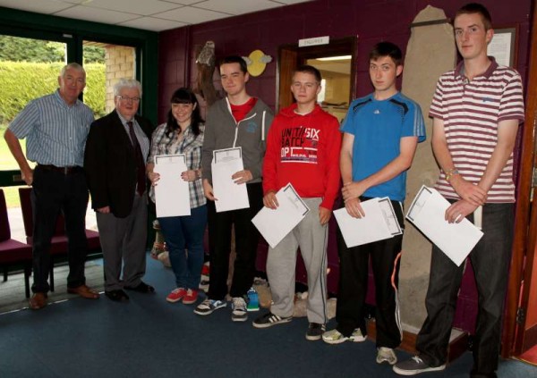 Receiving the results of Leaving Cert 2013 at Millstreet Community School on Wednesday morning. Pictured (from left): Derry Morley (Deputy Principal), Pat Pigott (Principal), Aoife O'Connor, Denis Breen, David Crean, Tadhg O'Callaghan and Mark O'Donovan.