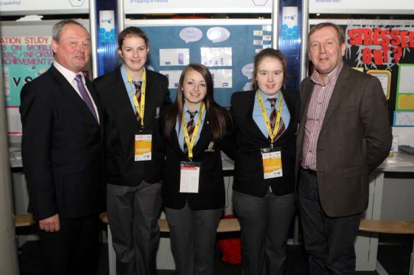  Michael Murray from BT and Michael Creed TD with students Amy McSweeney, Emma Browne and Rachel O'Brien from Millstreet Community School at the BT Young Scientist and Technology Exhibition 2014 which is taking place all this week at the RDS Dublin.