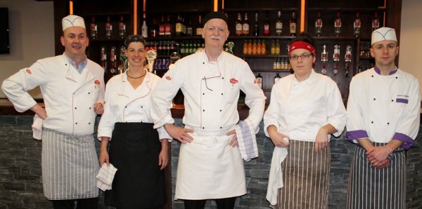 Head Chef Kevin Fleming (centre) welcomes Chef Stephanie Heffernan (second from right) to The Wallis Arms Kitchen Team. — with Petra Dietz, Stephanie Heffernan and Mateusz Dudek.