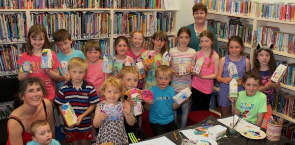 "Birds and Bird Houses" has been this year's theme for the hugely popular Millstreet Library Summer Arts Workshop presented by Artist, Amanda Wright (on left) and coordinated by Librarian, Breda O'Leary.   Here we view the wonderfully talented children with some of their beautiful artistic creations on Wednesday, 23rd July 2014.  Click on the images to enlarge.  (S.R.)