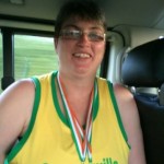 2014-08-11 Eileen O'Riordan with her two gold medals form the All Ireland Masters Track and Field Championships