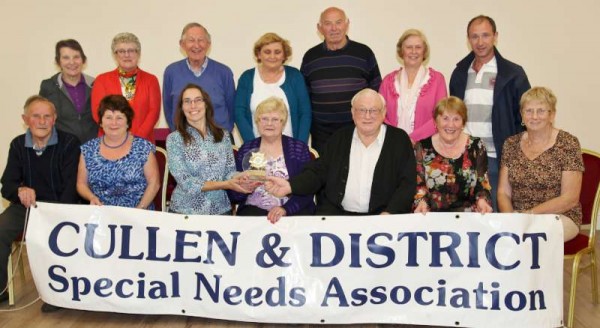 We thank Sheila Fitzgerald for the excellent photograph and the following caption:  Cullen and District Special Needs Association honoured it's two founder members last Monday night with a get together at the local Community Hall. The event was organised to mark the couple's 50th Wedding Anniversary, and their fellow members presented them with a commemorative plaque and a decorative anniversary cake Kathleen and Geff O Sullivan established the Special Needs Association 35 years ago and in the initial years held fundraising Vintage Shows at their own home. This event was relocated to the local Sports Grounds in later years and the subsequently named annual Harvest Day has always been a great success for the Club while the Weigh In during the Winter/Spring months is one of their major fundraisers. Secretary Moira O Keeffe told the Corkman that Kathleen and Geff  were "outstanding" and worked extremely hard at every event throughout the 35 years. "We only had to ring and ask for anything and it was done" Moira said, and this was indorsed by all those present. Monies raised by the Association go to Cope Kanturk, Mallow, and Cork, St. Joseph's Foundation, Charleville, Tearman Lodge, Rathmore, and The Monastery, Killarney." 