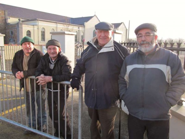 With a chill in the air on this beautiful sunny January morning the four gentleman are wise to wear appropriate head attire - pictured at West End, Millstreet. Click on the image to enlarge. (S.R.)