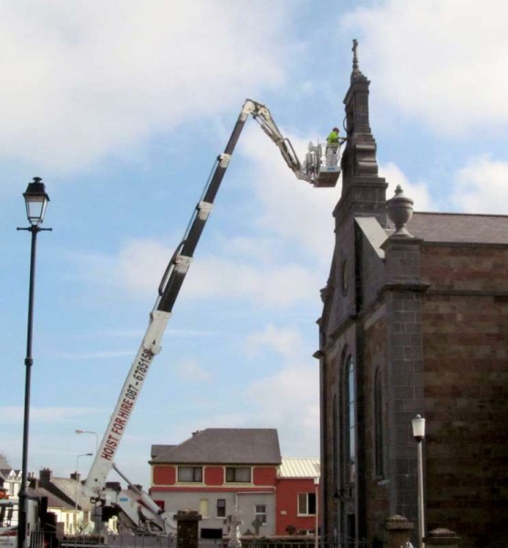 The impressive scene outside St. Patrick's Church, Millstreet this Wednesday morning (8th April 2015) with Martin Leader's Hoist in place - not to check out the "Golden Eagles" location as people humorously surmised - but rather the continuation of Church maintenance near the bell tower.  Click on the images to enlarge.  (S.R.)